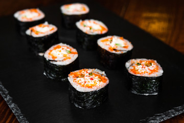 dishes of Japanese cuisine rolls with fish