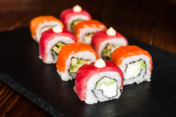 dishes of Japanese cuisine rolls with fish