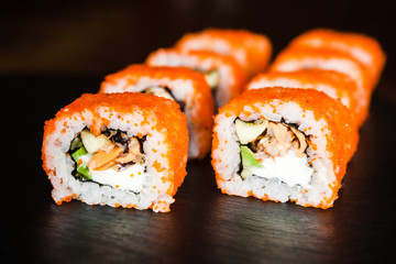 dishes of Japanese cuisine rolls with fish