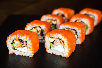 dishes of Japanese cuisine rolls with fish
