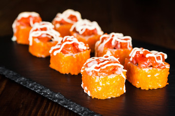 dishes of Japanese cuisine rolls with fish