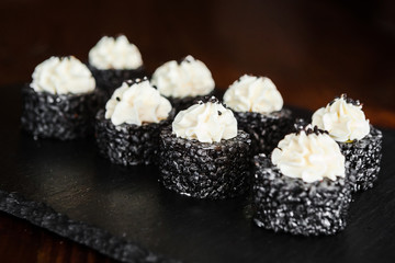 dishes of Japanese cuisine rolls with fish