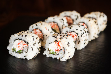 dishes of Japanese cuisine rolls with fish