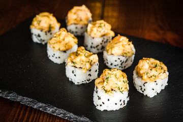 dishes of Japanese cuisine rolls with fish