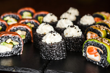 dishes of Japanese cuisine rolls with fish