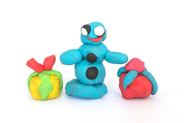 play doh sculpture of Santa Claus on white background