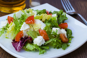 Dietary salad with tomatoes and feta cheese
