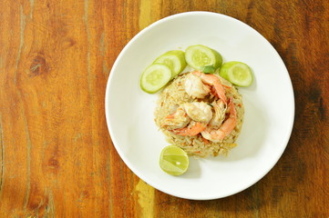 fried rice with prawn and cucumber on white plate