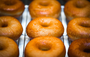 Fresh donuts background image. Macro with shallow dof.