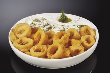 Plate of Delicious Fried calamari with Seafood pasta