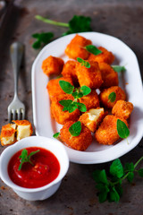 Halloumi Nuggets with Marinara Dipping Sauce.selective focus