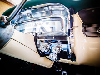 the steering wheel in the classic car in color