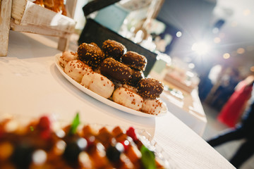 Elegant candy bar for a wedding full of pastries
