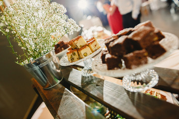 Elegant candy bar for a wedding full of pastries