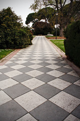 Walk with tiles in the garden