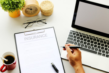 Insurance on table in Office Business