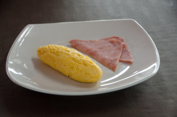 American Breakfast with omelet egg and ham