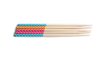 pastel pink chopsticks on a white background

