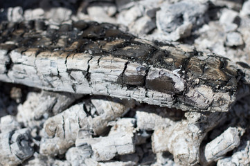Coals and ash after the fire