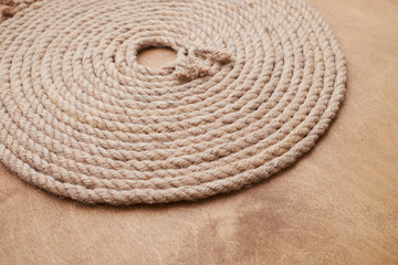 Fototapeta na wymiar rope braided twisted natural sea port transportation