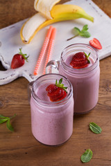Milkshake with strawberries and banana. Strawberry smoothie