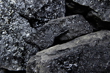 Close up of black coal pile. Coal mining