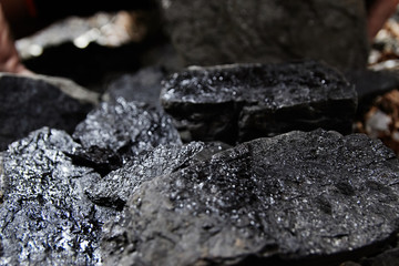 Close up of black coal pile. Coal mining