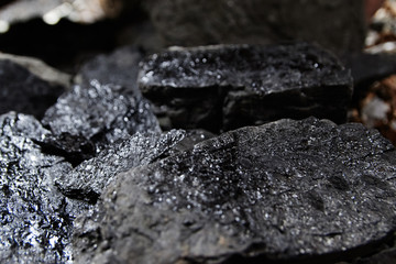 Fototapeta premium Close up of black coal pile. Coal mining