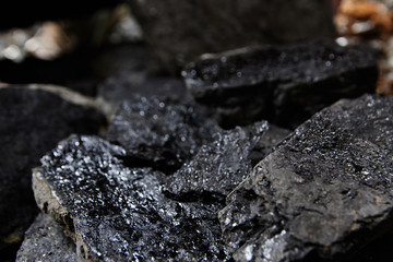 Close up of black coal pile. Coal mining