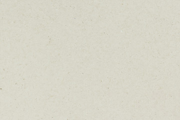 White beige paper background texture light rough textured spotted blank copy space background in beige yellow,brown