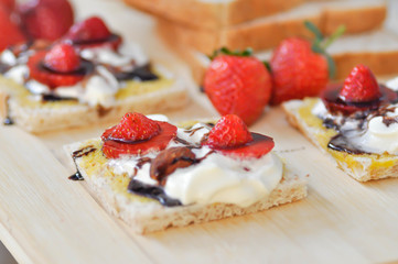whole wheat bread and canape with strawberry