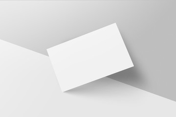 Blank business cards on gray background. Mockup for branding identity.
