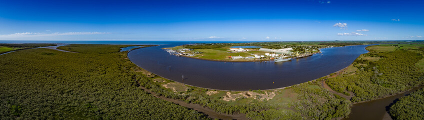 Burnett Heads, Queensland / Australia - April 2017 - Aerial Panorama of the Burnett River Mouth including EX HMAS Tobruk docked at the Port of Bundaberg