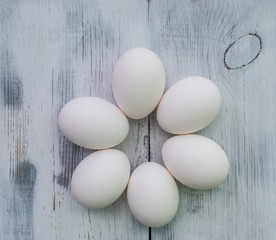 White eggs on a gray background