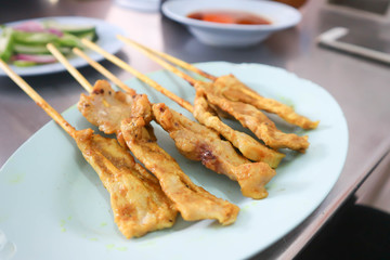 barbecue or barbecued pork or pork satay