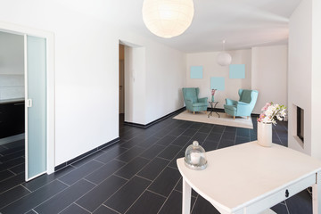 Detail of a small coffee table in the corner of the living room