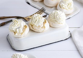 baked cakes of whipped egg whites and cream