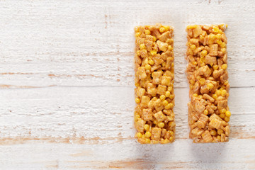 Granola bar on wooden background