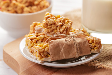 Granola bar on wooden background