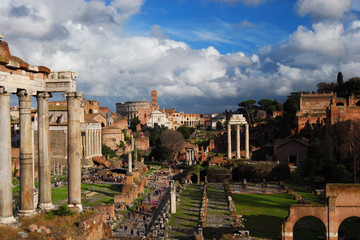 Fototapeta na wymiar View of the Roman Forum ancient monuments with beautiful clouds from Capitoline Hill in Rome