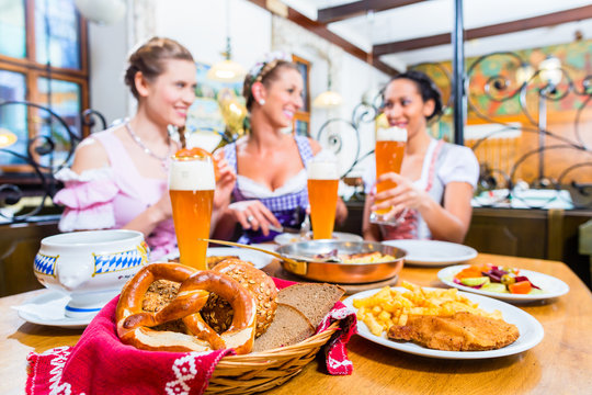 Three women eating lunch or dinner in Bavarian Restaurant
