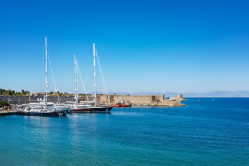 Boats in front of city walls in City of Rhodes (Rhodes, Greece)