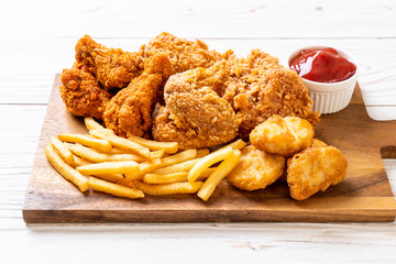 fried chicken with french fries and nuggets meal