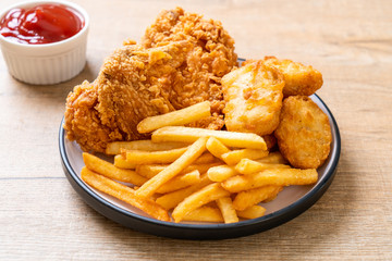 fried chicken with french fries and nuggets meal