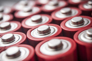 Fototapeta na wymiar closeup of red and silver aa alkaline batteries group