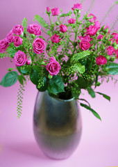 Bouquet of flowers with roses and other plants close up