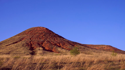 Hills of red sand, clay