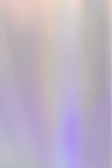 Blurry abstract holographic foil background