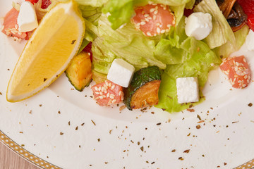 Caesar salad with red fish