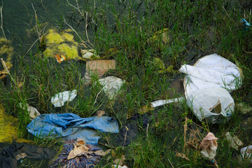Top view of dirty waters by garbage. Ecological industry concept